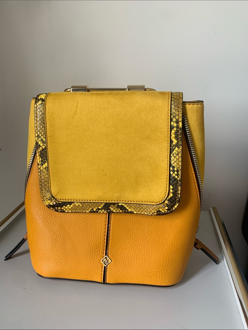 Call It Spring Two-Tone Yellow & Mustard Snake-Trim Backpack